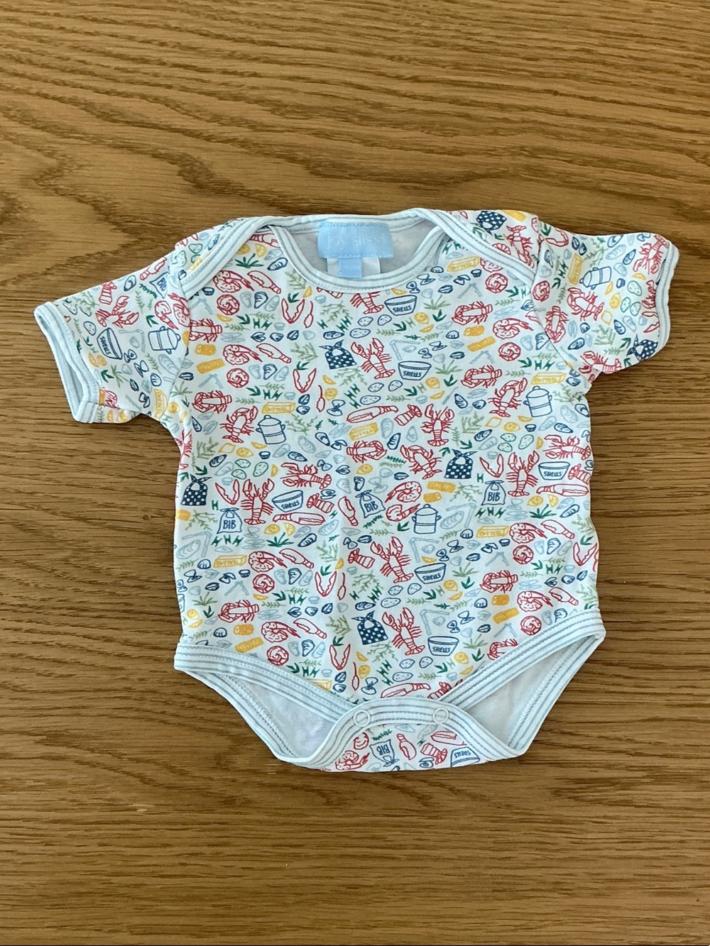 White Short-Sleeve Baby One-Piece with Colorful Sea Life Print